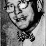 Low quality image of middle ae white man with glasses and a biw ties