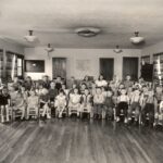 Historical photo of a children's Bible class at St Johns Community Center"