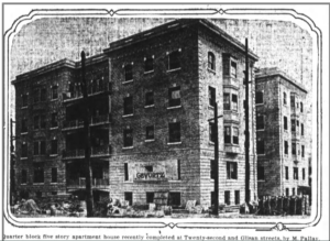 Image of a five story apartment building. Low quality B&W image from a newspaper.