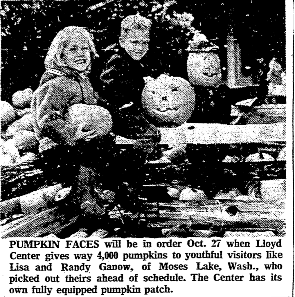 Two 8 year-olds (approx) in a pile of pupkins. "Pumkin faces will be in order Oct. 27 when Lloyd Center gives way 4,000 pumpkins to youthful visitors like Lisa and Randy Ganow, of Moses Lake Wash., who picked their ahead of schedule. The Center has its own fully equipped Pumpkin Patch.