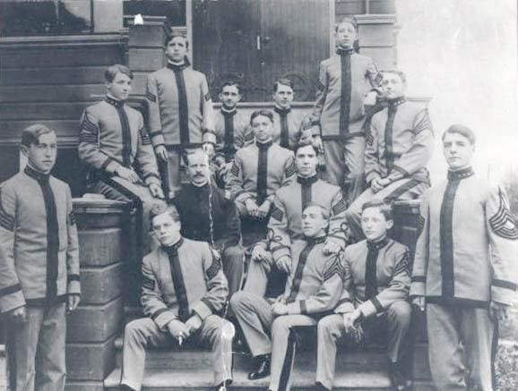 Image of Cadets and one of their instructors gather on the front steps of the main building on Marshell St and 24th in Northwest Portland in 1905-the party in this timeline was the second year the school was opened. The school would have been four years old when this photo was taken. Credit OHS #017499