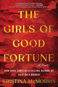 The Girls of Good Fortune Kristina McMorris in gold font a striking crimson or deep read background ornate floral on silk maybe pattern