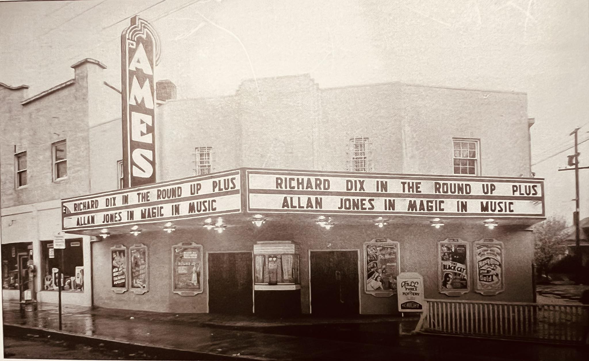 Faded image of Ames Theater