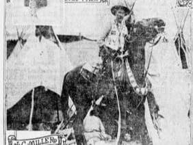Circus performer a cowboy on a horse with T-pees behind bucking steer